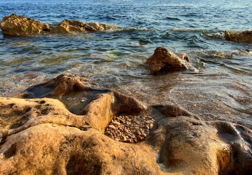 Stones and pebbles on sea shore
