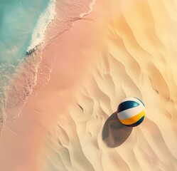  Bright volley ball on the sandy sea beach. Summer sports beach vacations concept. Top view. Copy space.