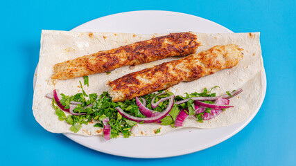 Lula kebab on plate top view