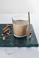 coffee drink in a glass on the table with accessories