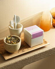 herbal hot tea with cups on the shelf