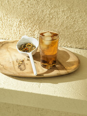 herbal hot tea with cups on the shelf