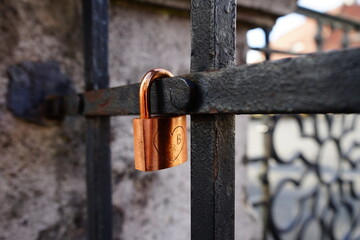Padlock left by lovers on a bridge