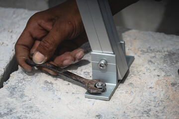 Assembling the mounting brackets for the rooftop solar cell system