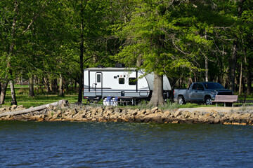 travel trailer camping at Thomson Causeway in the forest  by the Mississippi river in Illinois