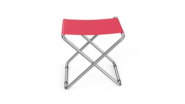 Red folding stool on white background