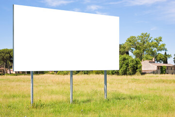Empty advertising billboard in a rural landscape - Concept of countryside scenery with copyspace for adding text