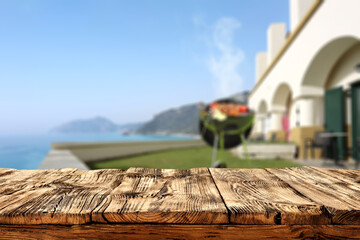 Wooden desk of free space and grill time 