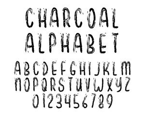 Charcoal alphabet. Black letters and numbers with charcoal pencil texture isolated on white background. Vector illustration.