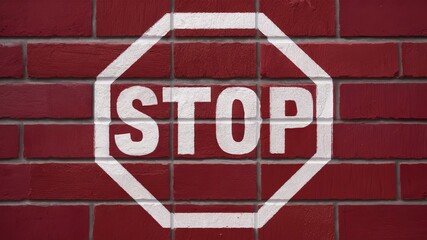 Stop sign on a red brick wall.