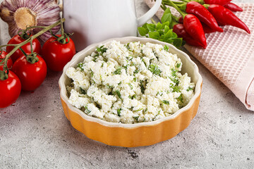 Curd cheese with green herbs