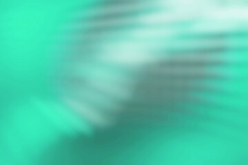 A closeup shot showcasing the vibrant colors of water with electric blue and magenta hues. The liquids texture is highlighted, revealing intricate patterns and shades.