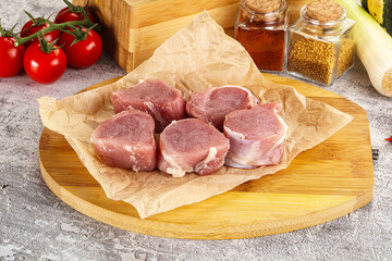 Uncooked raw pork tenderloin medallions
