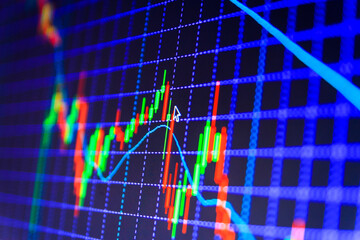 Conceptual view of the foreign exchange market Digital stock market listing on a tablet screen Business graph with tending Stock market graph analysis for finance investment Blue bac