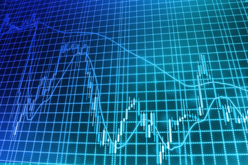 Businessman holding tablet with growing virtual hologram of statistics, graph and chart Stock trading chart on monitor screen Stock market graph analysis for finance investment