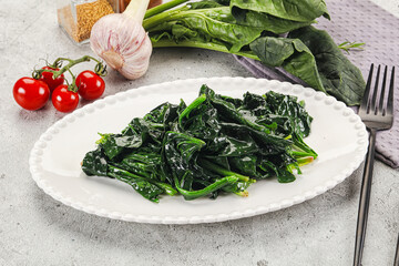 Coocked green spinach with oil