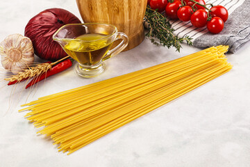 Raw dry Italian pasta - spaghetti