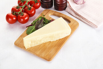 Piece Italian hard parmesan cheese