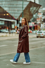 Obraz premium A Casual Girl Poses with Confidence and Style on Urban Streets