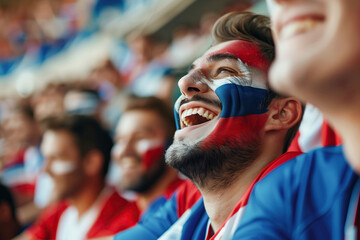 Excited French Football Fan Cheering in the Stadium with Painted Face