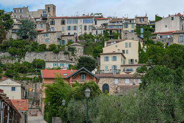 Fototapeta premium View of Biot village, a small, medieval, fortified historic village, located on a hilltop in the Provence-Alpes-Cote d'Azur, near the town of Antibes, between the cities of Nice and Cannes, France