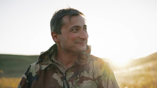 Portrait of a smiling male soldier.