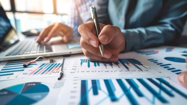 A diverse team of financial experts discussing stock market strategies and analyzing performance graphs during a meeting