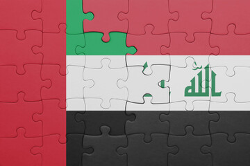 puzzle with the colourful national flag of iraq and flag of united arab emirates .