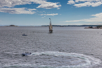 A large sailing frigate, barque or brig sails on a calm sea. Regatta in the North Sea, boat, yacht...