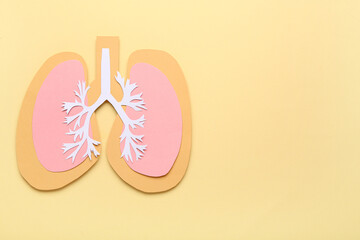 Paper lungs on beige background
