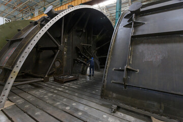 Body parts of a low pressure turbine at factory workshop.