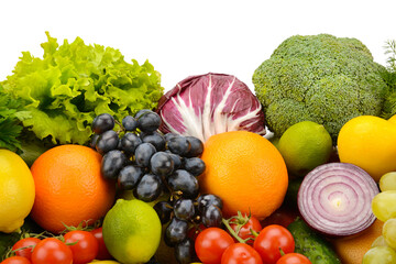Fresh vegetables and fruits closeup isolated on white