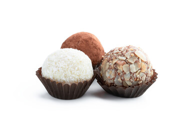 Delicious truffles with variety sprinkling isolated on white