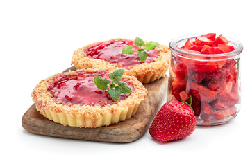 Delicious strawberry mini tartlets isolated on white