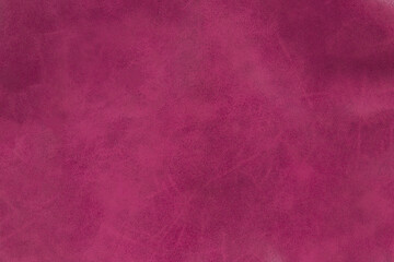 Pink faux leather texture background close-up