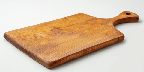 Fototapeta premium A wooden cutting board placed on a clean white surface, ready for use in the kitchen