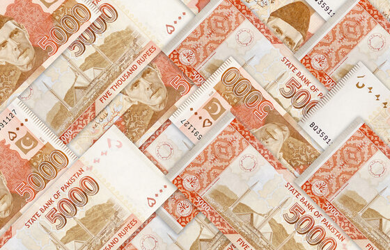 Rs 5000 Five Thousand Rupees Pakistani Currency Bank notes arranged in an angular pattern