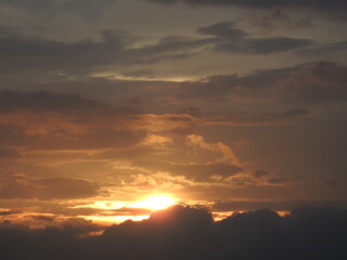 A fiery sunset breaking through the clouds above Kent County, Delaware. 	