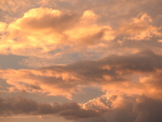 Evening clouds highlighted by the sun over Kent County, Delaware. Cloudscape.