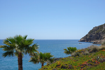 View to Albir coast and blue Mediterranean Sea. Albir is stylish modern seaside resort of L' Alfas del Pi, Alicante province, Spain