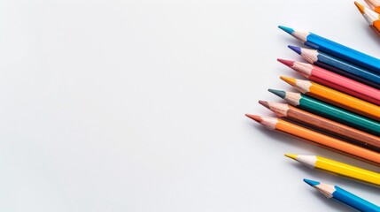Fototapeta premium colorful pencils on a white background, copy space, place for text, creative ideas, art school, hobby, passion, education 