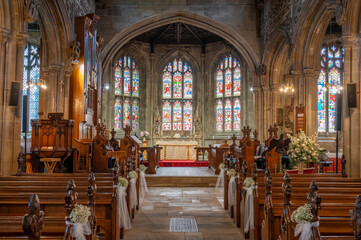 Fototapeta premium Inside of a church looking up the aisle