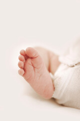 details of newborn baby with white background
