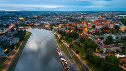 Fototapeta premium aerial view of krakow center and wawel royal castle at sunset in summer in poland
