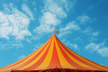 Colorful circus tent under a blue sky