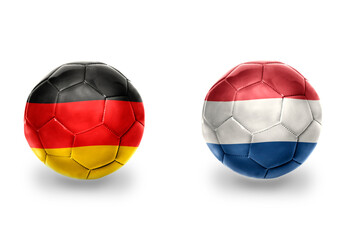 Fototapeta premium football balls with national flags of germany and netherlands ,soccer teams. on the white background.