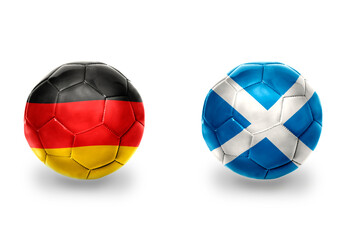 football balls with national flags of germany and scotland ,soccer teams. on the white background.