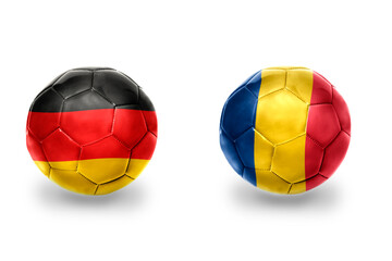 football balls with national flags of germany and romania ,soccer teams. on the white background.