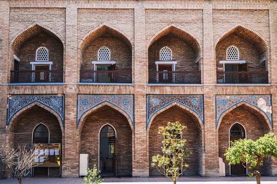 Cells of students in the courtyard of ancient educational Islamic madrasah Kukeldash in Tashkent in Uzbekistan