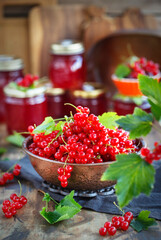 Fresh ripe Red currant or Red Ribes (Ribes rubrum) on wooden rustic background